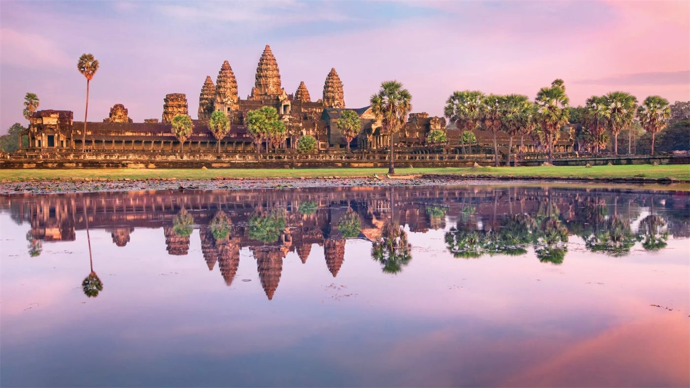 Angkor Wat at sunrise, visited on the Vietnam and Cambodia river cruise