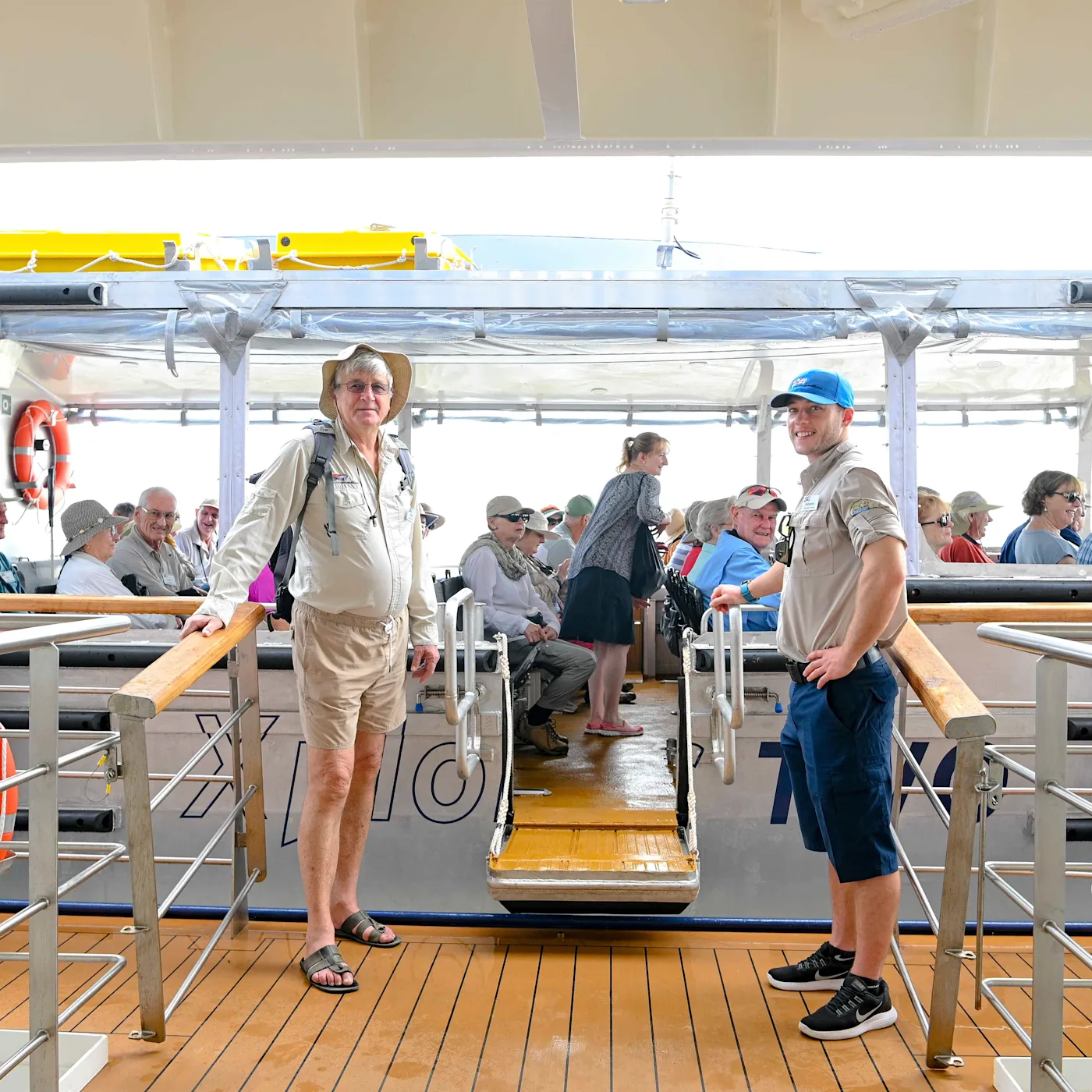 Guests boarding the Xplorer tender from Coral Discoverer